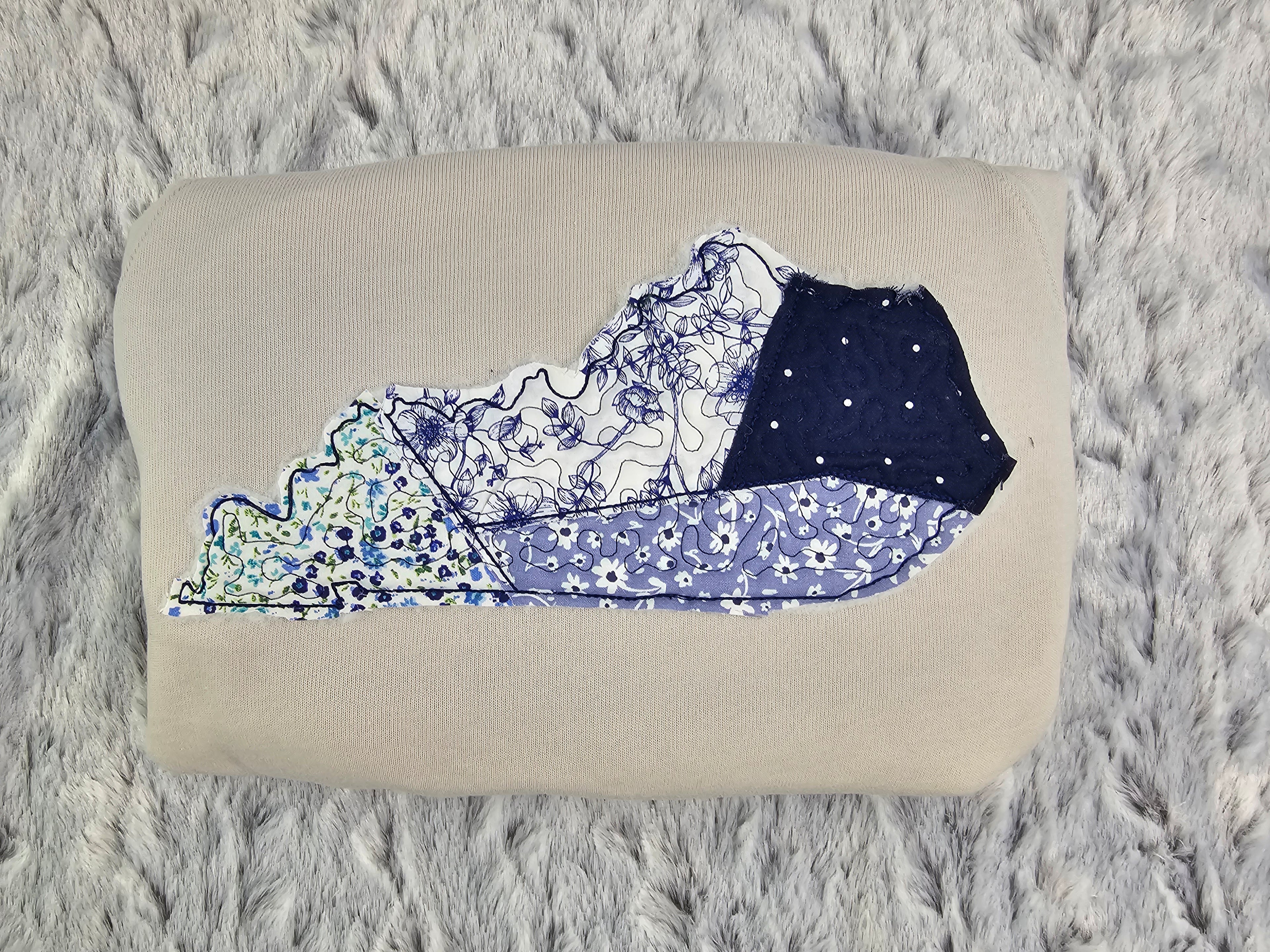 Embroidered/quilted State applique shirt