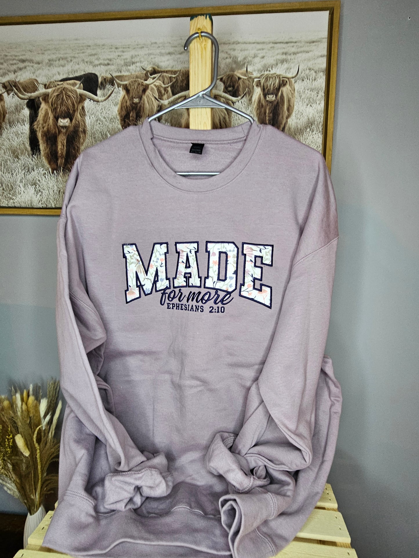 long sleeve white cropped sweat shirt.
