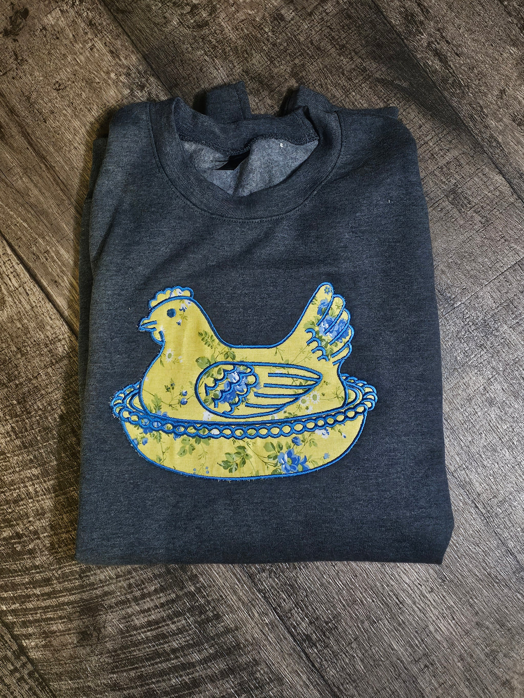 YELLOW HEN IN A BASKET