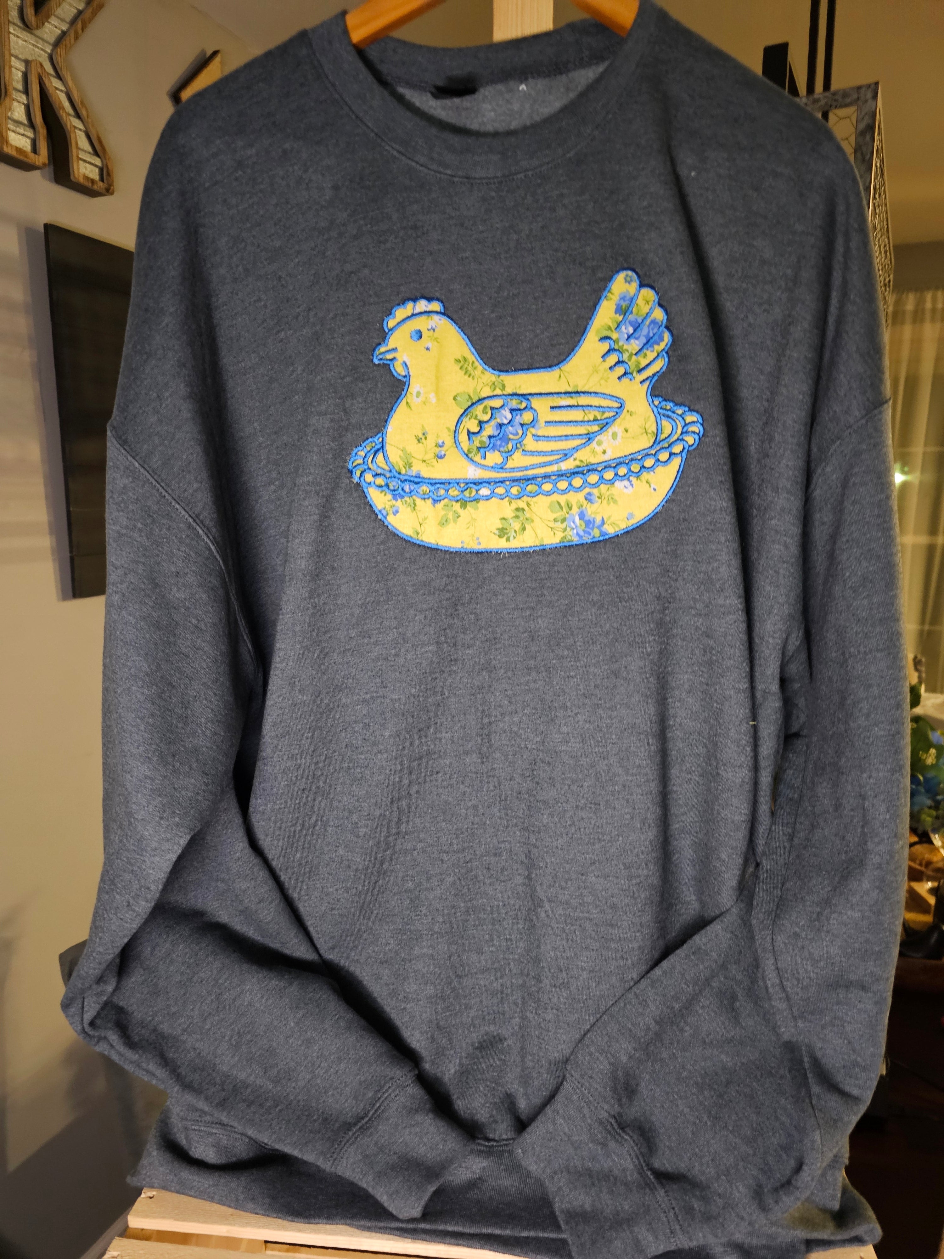 YELLOW HEN IN A BASKET