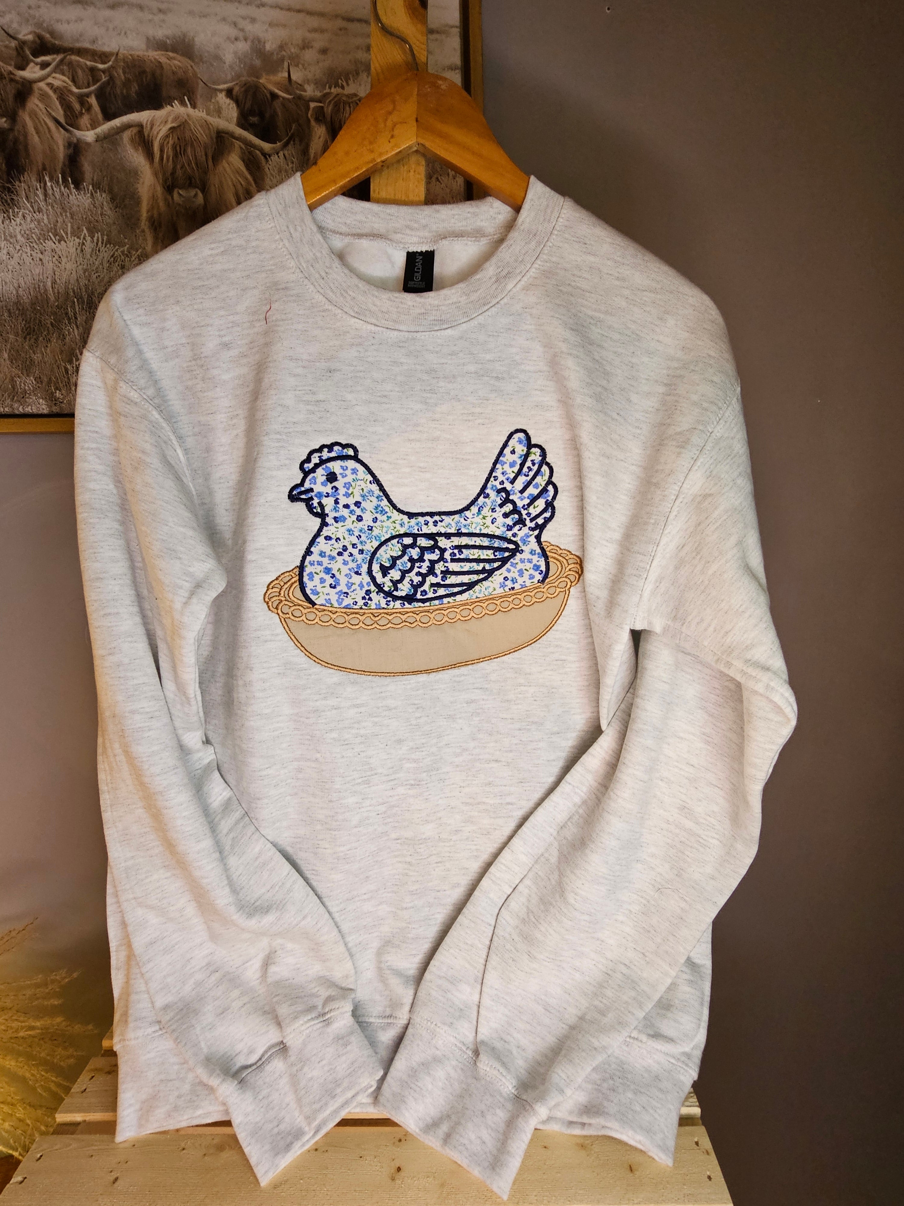 BLUE Hen in a basket