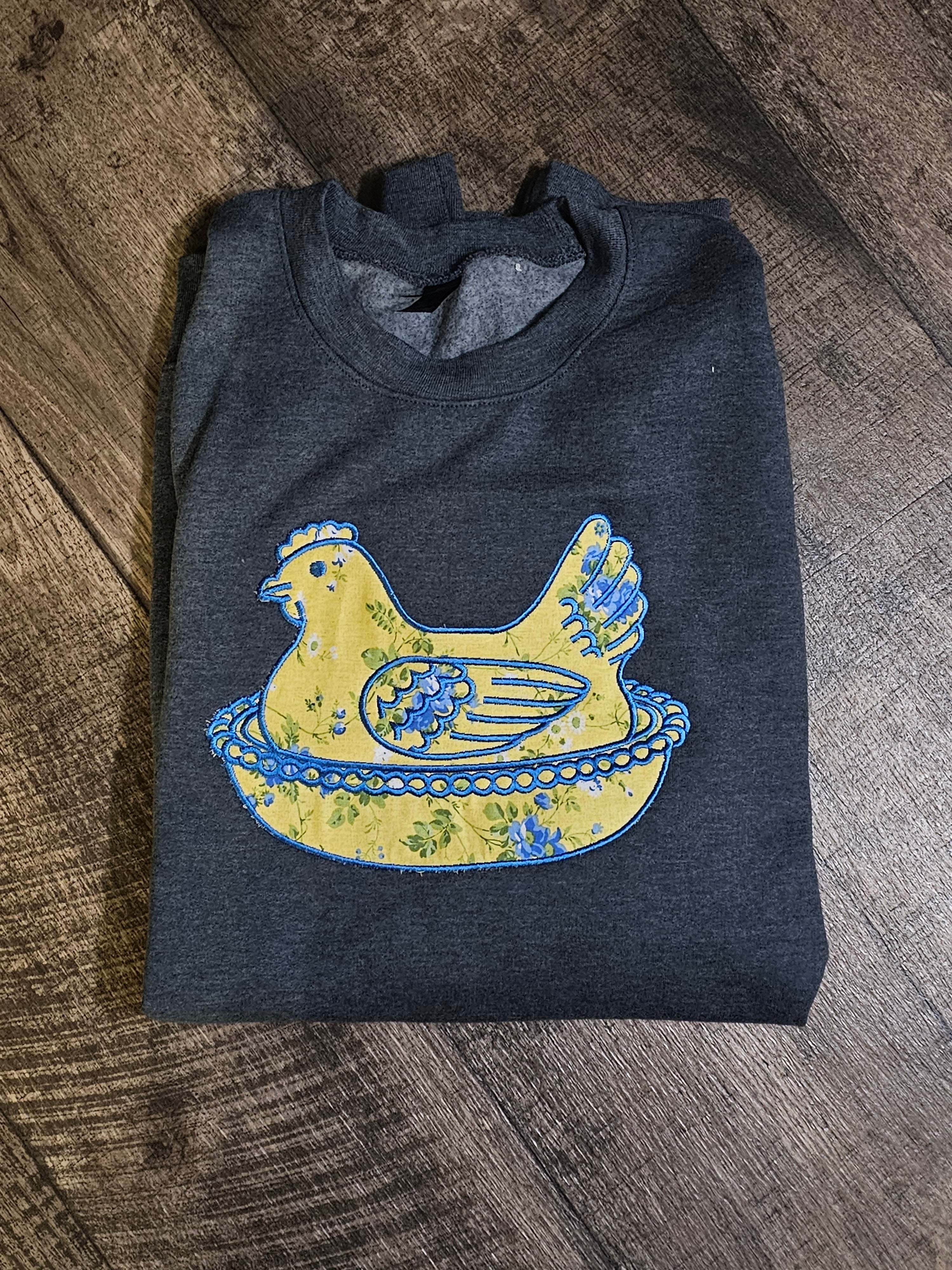 YELLOW HEN IN A BASKET