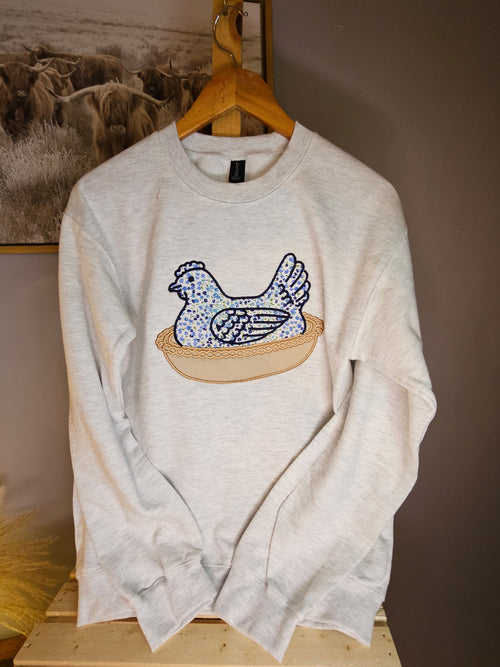 BLUE Hen in a basket