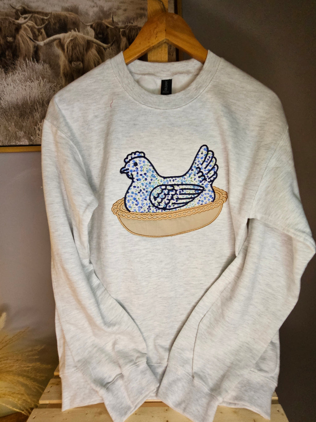 BLUE Hen in a basket