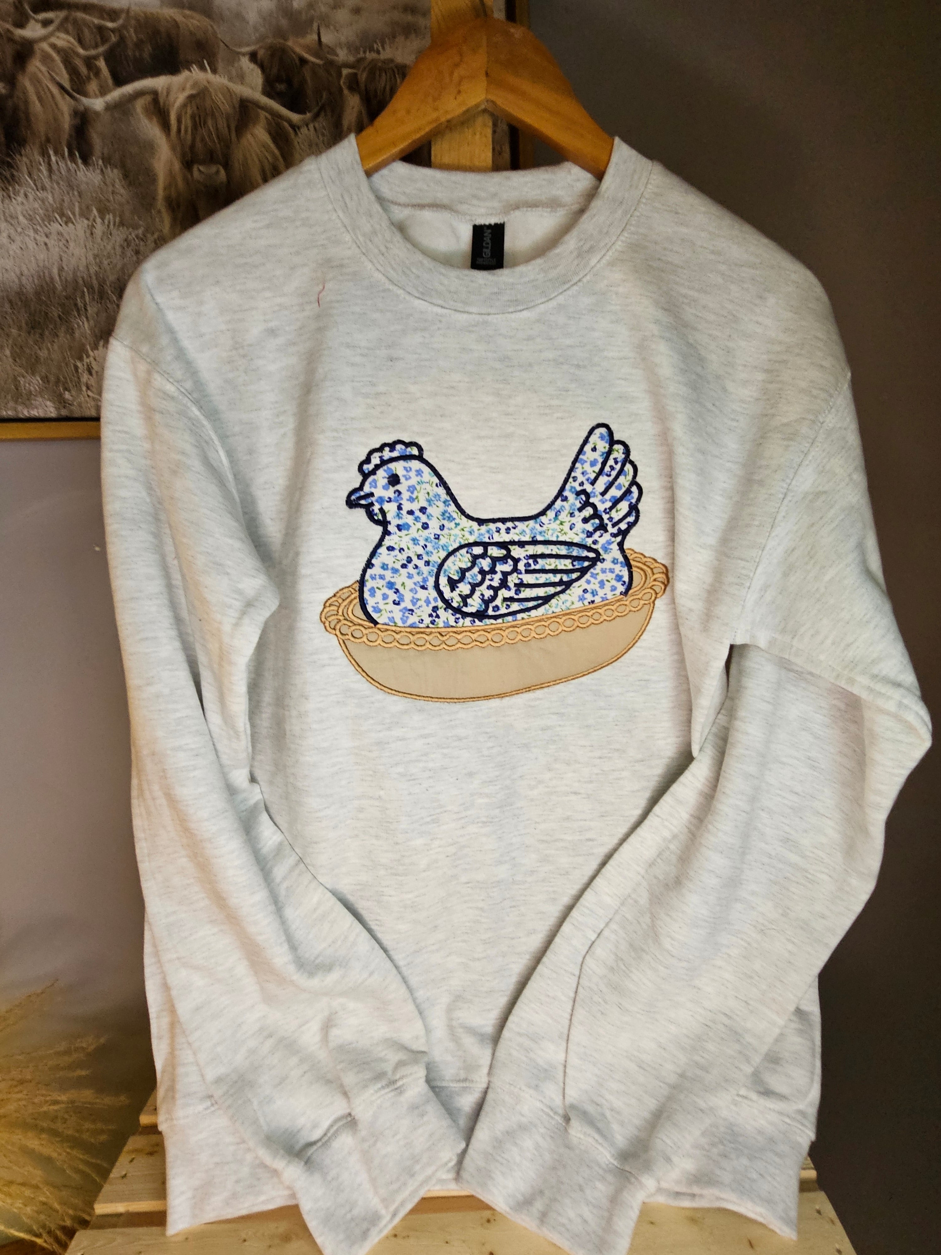 BLUE Hen in a basket