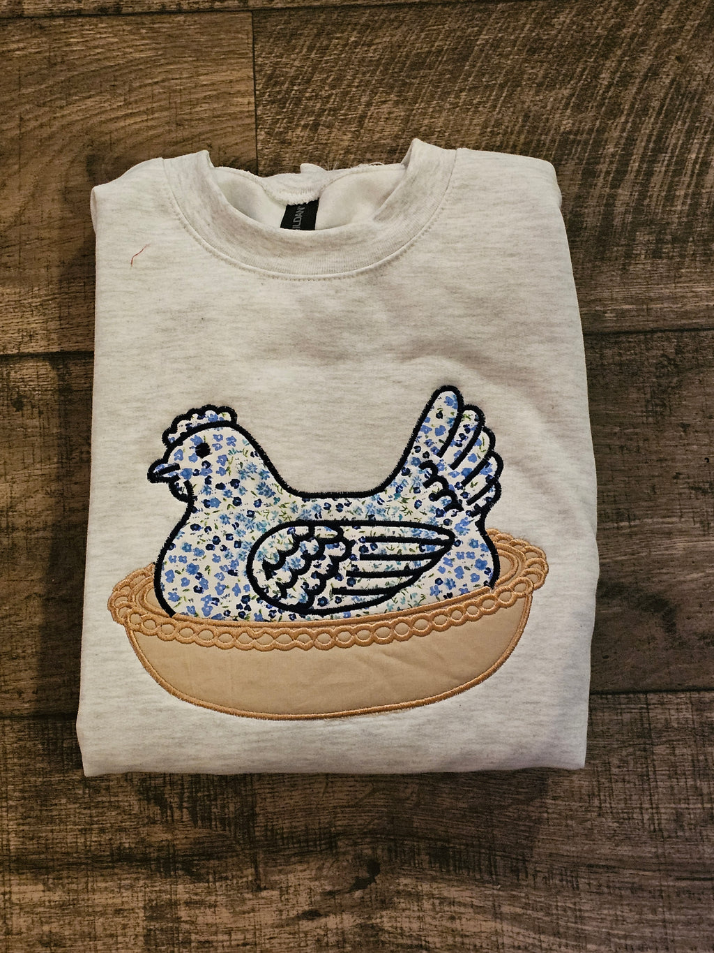 BLUE Hen in a basket