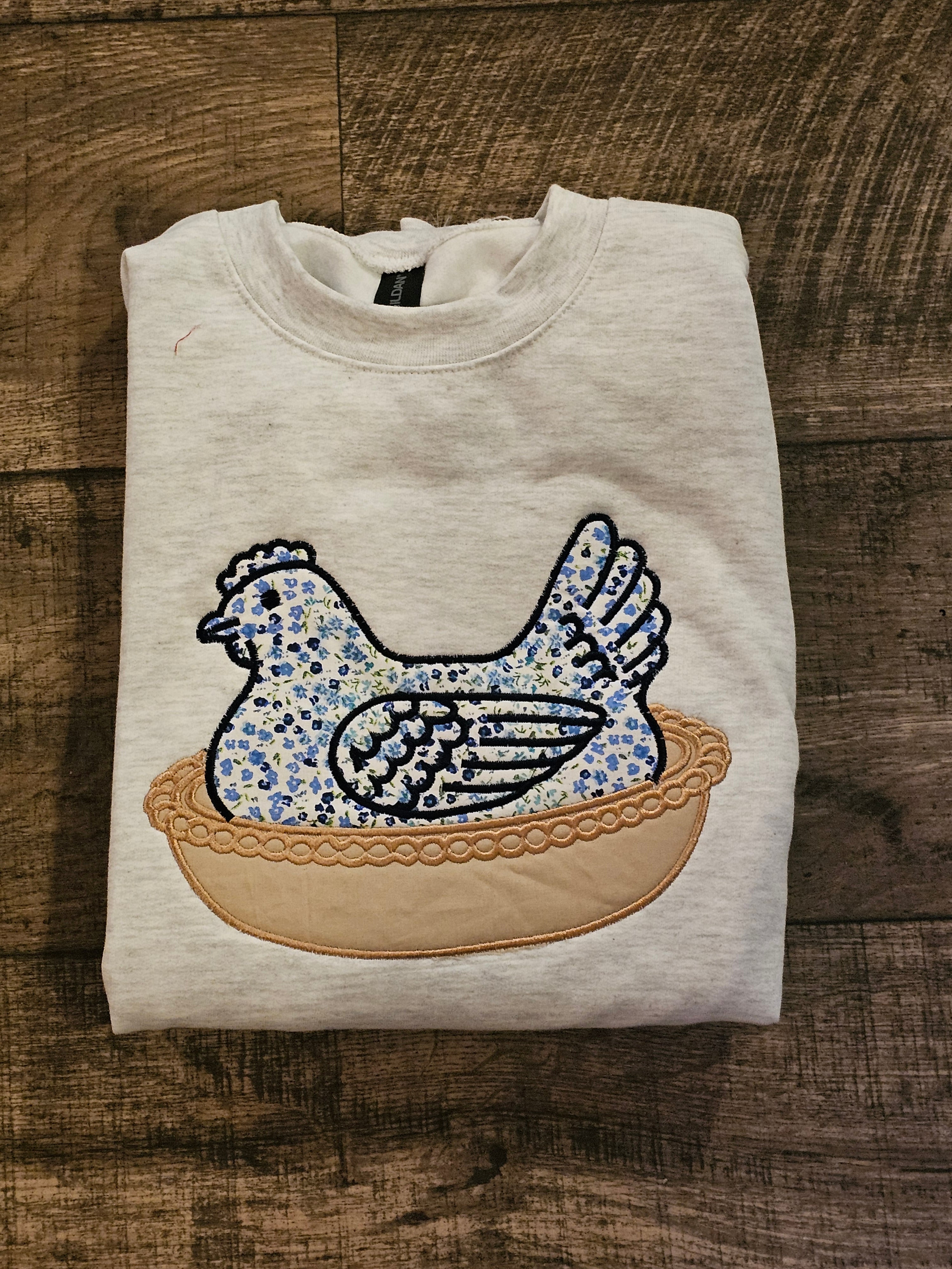 BLUE Hen in a basket