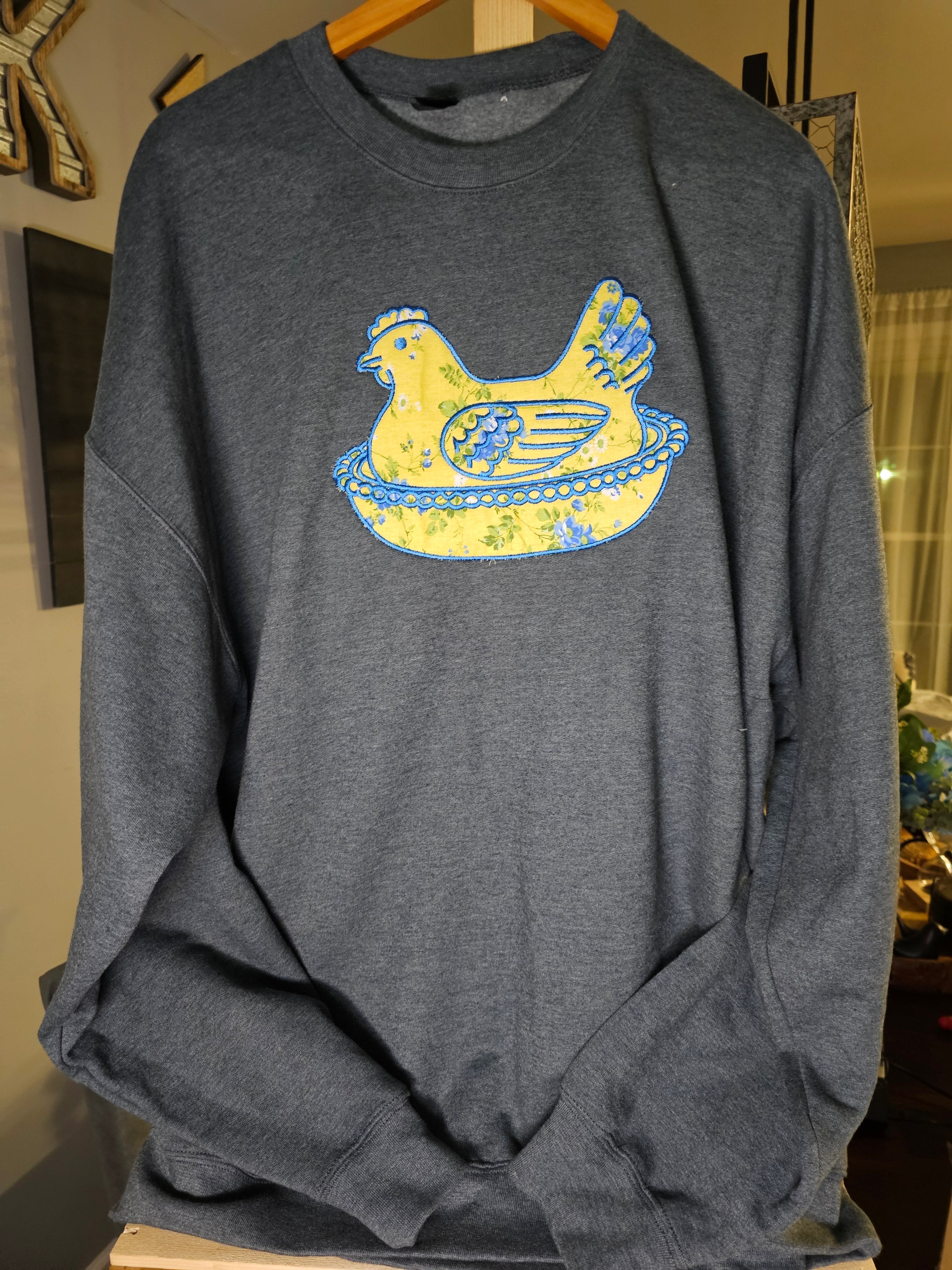 YELLOW HEN IN A BASKET