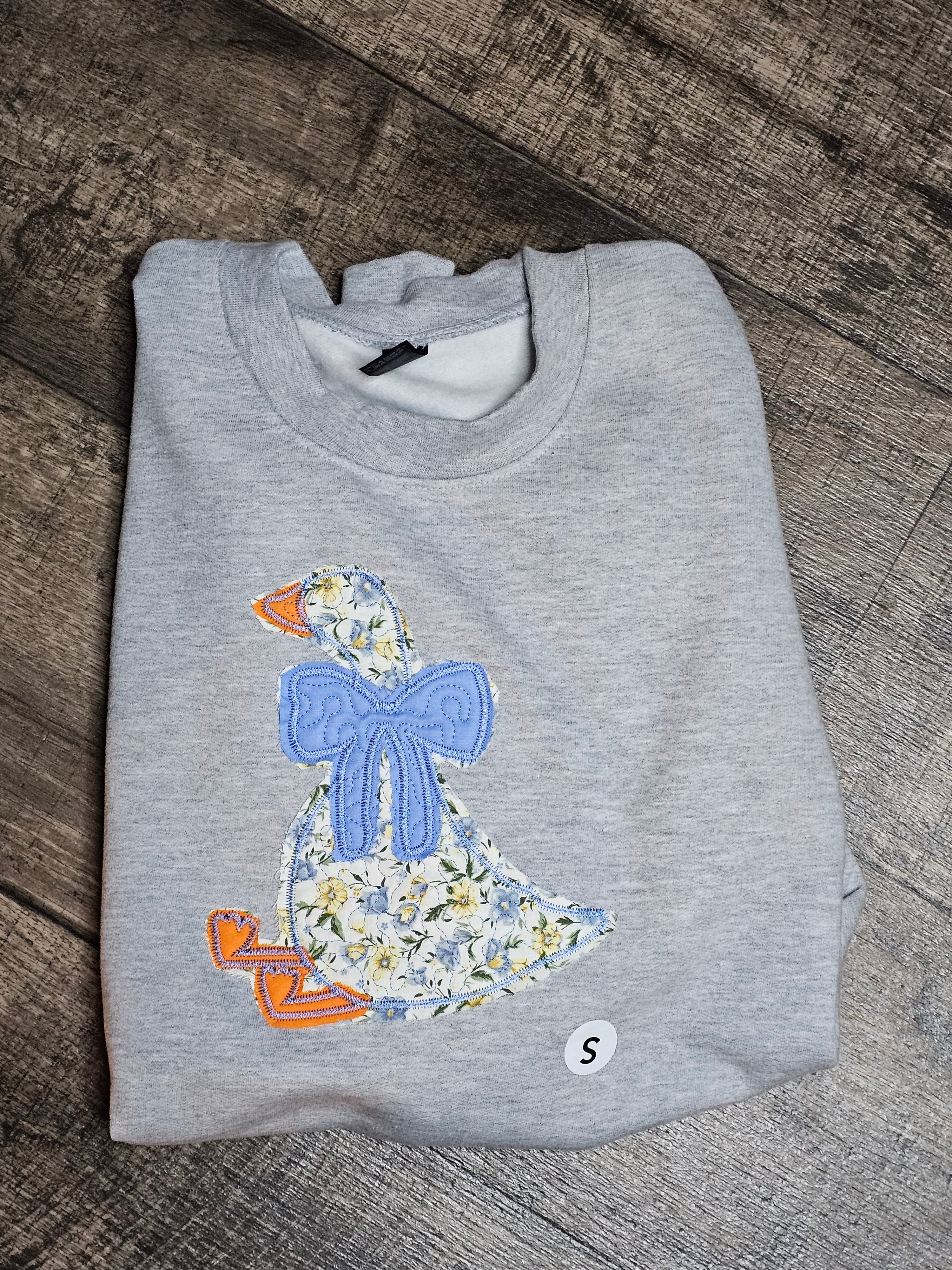 Quilted silly goose crewneck
